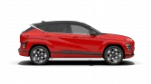 Roter kompakter SUV seitlich mit schwarzem Dach und urbanem Hintergrund, moderne kantige Linienführung