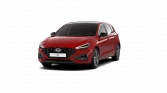 Roter Hyundai Kompaktwagen frontal vor schwarzem Hintergrund, sportliches Design, LED-Scheinwerfer sichtbar