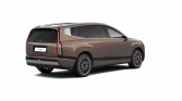 Brauner Hyundai Elektro-SUV in Heckansicht auf weißem Hintergrund, modernes Design und große Räder sichtbar