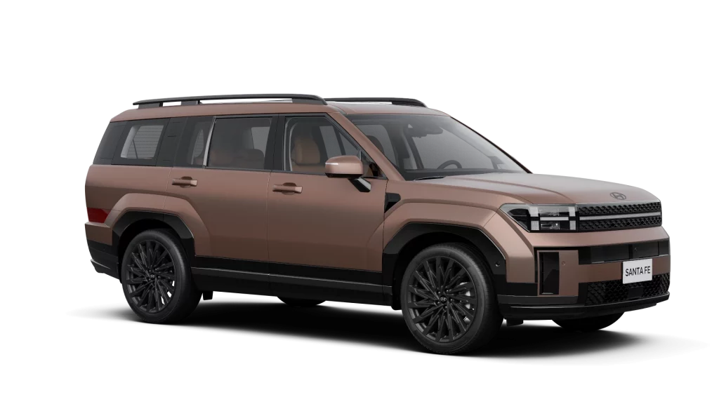 Bronze‑metallisches Hyundai Hybrid‑SUV, Dreiviertel‑Frontansicht im Studio vor schwarzem Hintergrund