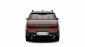 Warmbrauner Hyundai SUV, Heckansicht, Hybrid‑Variante vor schwarzem Studiohintergrund